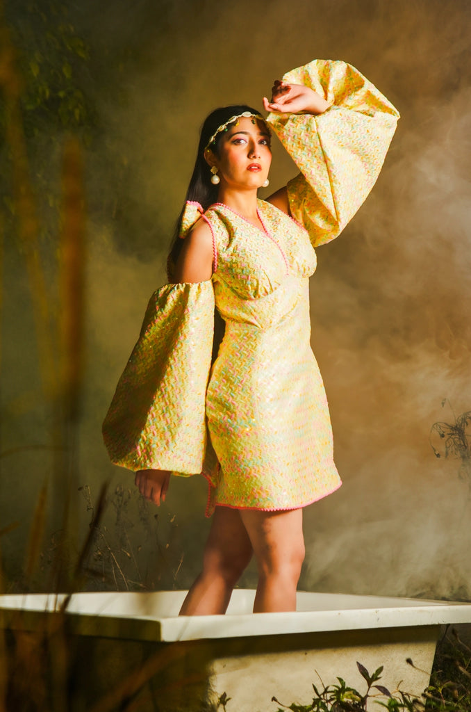 Full front view of Haseena Puff Sleeve Dress with dramatic puff sleeves, pastel embroidery, and mini silhouette.