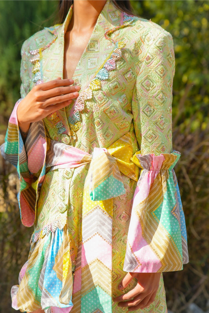 Closeup of Noor Blazer Dress with pastel Bandhani tie-up belt and ruffled sleeve detailing.
