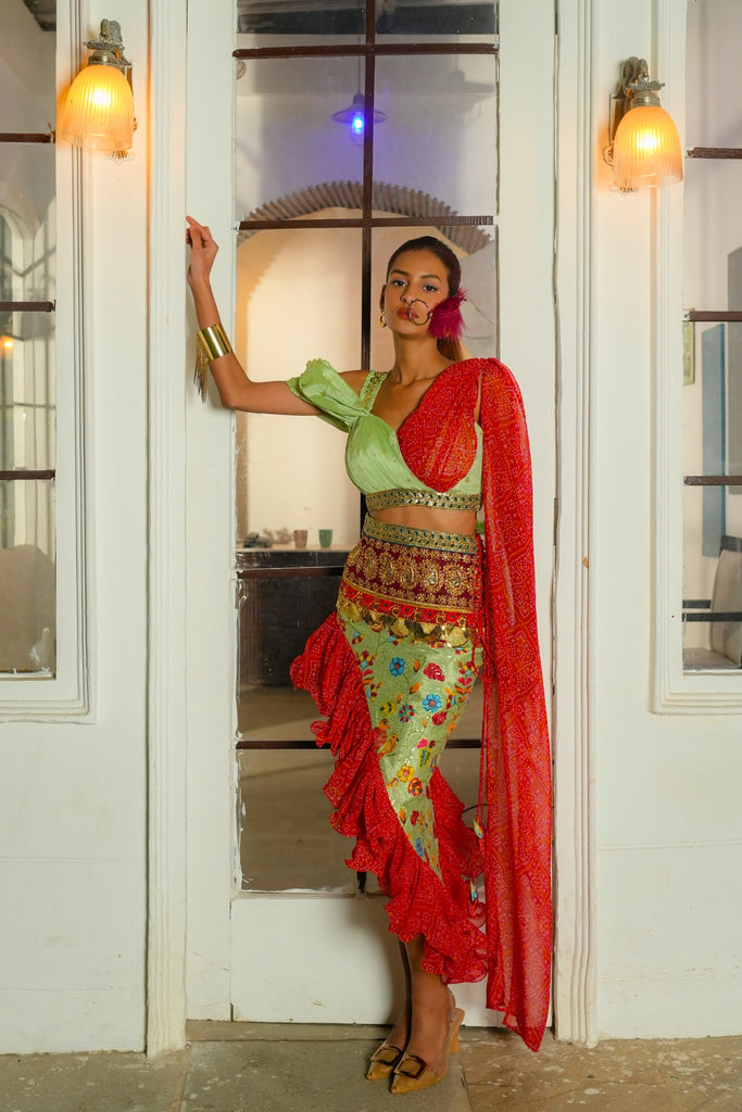 Full front look of Titli Ruffle Skirt Set with pleated blouse, attached dupatta, and asymmetric embroidered skirt.